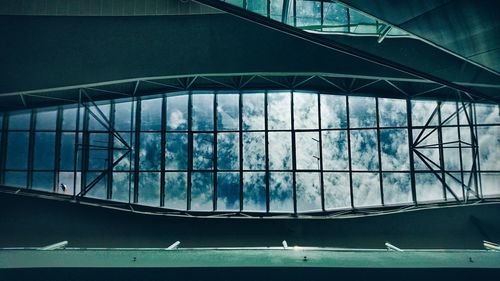 Reflection of building on glass window