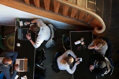 High angle view of people sitting at cafe