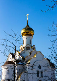 Low angle view of building against clear blue sky
