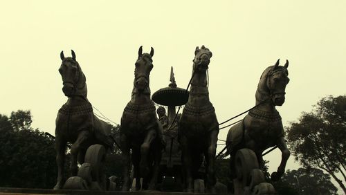 Low angle view of statue against clear sky