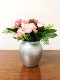 Close-up of flower vase on table