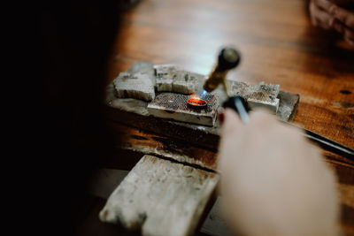 Close-up of wedding rings on table