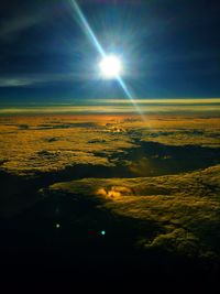 Aerial view of landscape against cloudy sky