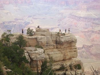 Tourists on rock formation