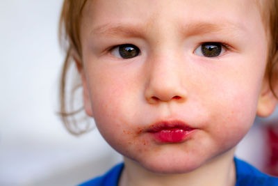 Perplexed toddler seen up close and personal 