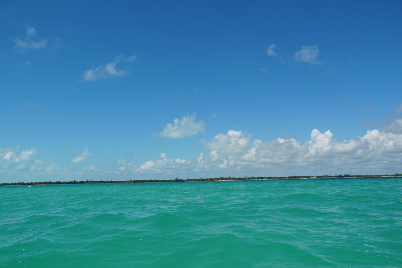 PANORAMIC VIEW OF SEA AGAINST BLUE SKY