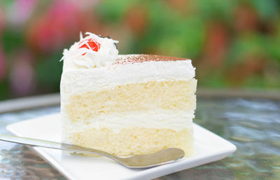 Close-up of cake in plate on table