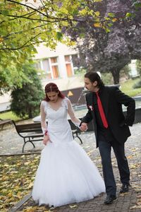 Young couple walking outdoors