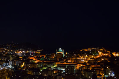 Illuminated cityscape at night