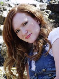 Portrait of young woman with brown hair