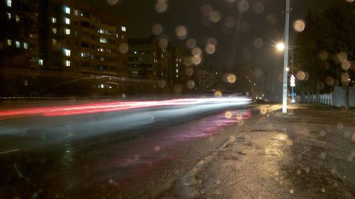 Light trails on city street at night