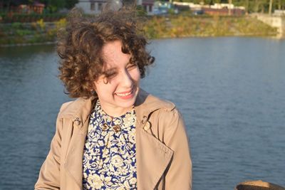 Woman looking at river