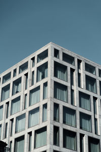 Low angle view of modern building against clear sky