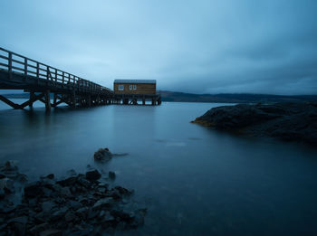 Scenic view of sea against cloudy sky