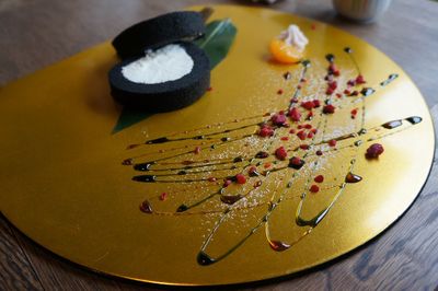 High angle view of cake in plate on table