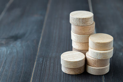Close-up of stacked wooden blocks on table