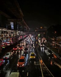 High angle view of traffic on city street at night