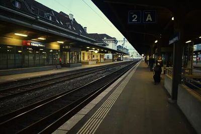 Railroad station platform at night