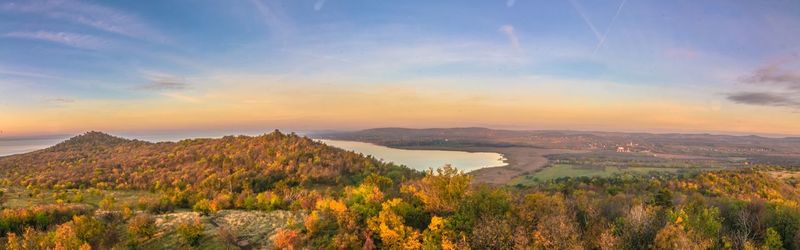 Scenic view of landscape against sky during sunset