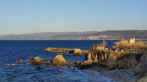 Scenic view of sea against clear sky