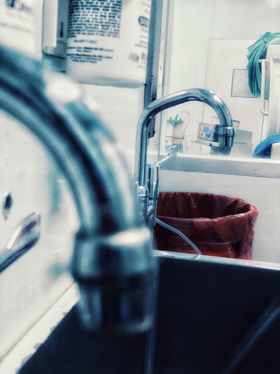 CLOSE-UP OF FAUCET IN SINK