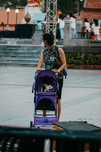 Rear view of couple walking outdoors