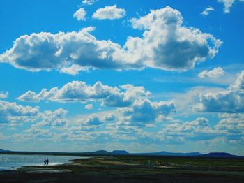 Scenic view of sea against cloudy sky