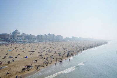 Crowd at beach in city