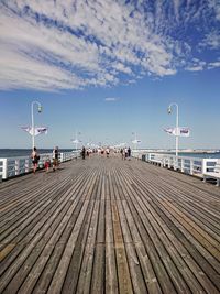 Pier over sea against sky