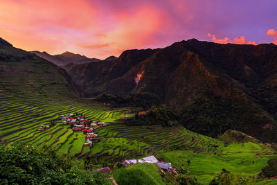 Scenic view of mountains against sky during sunset