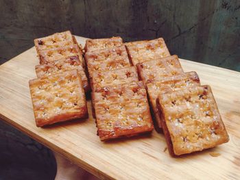 High angle view of bread on cutting board