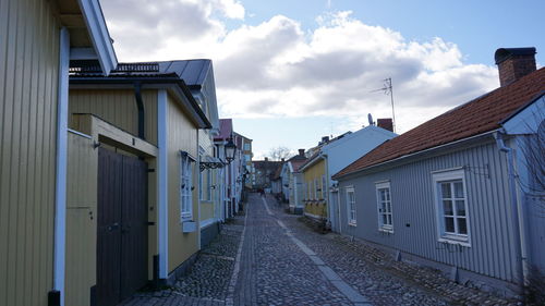 View of alley way through buildings