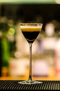 Close-up of wine glass on table