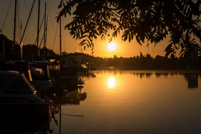 Silhouette of marina at sunset