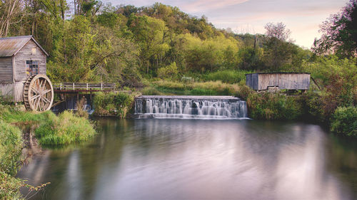 A wooden water wheel mill located in rural wisconsin. hyde's mill,on mill creek.