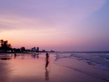 Scenic view of sea against sky at sunset