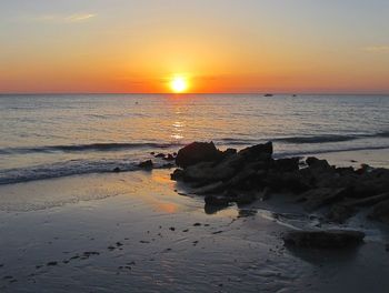 Scenic view of sea at sunset