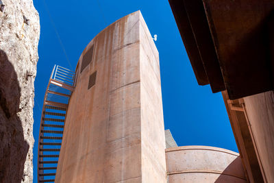 Low angle view of historical building against blue sky