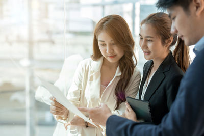 Business colleagues discussing in office