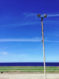 Scenic view of sea against blue sky