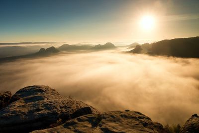 Scenic view of mountains against sky during sunset