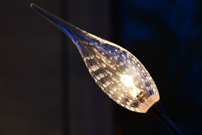 Close-up of illuminated light bulb