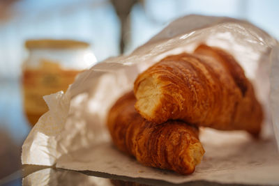 Close-up of croissants on table