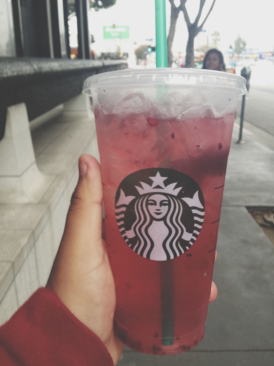 person, drink, food and drink, refreshment, red, holding, part of, cropped, close-up, personal perspective, lifestyles, focus on foreground, unrecognizable person, leisure activity, freshness, day