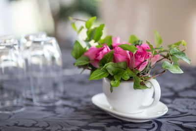 Close-up of pink flowers on table