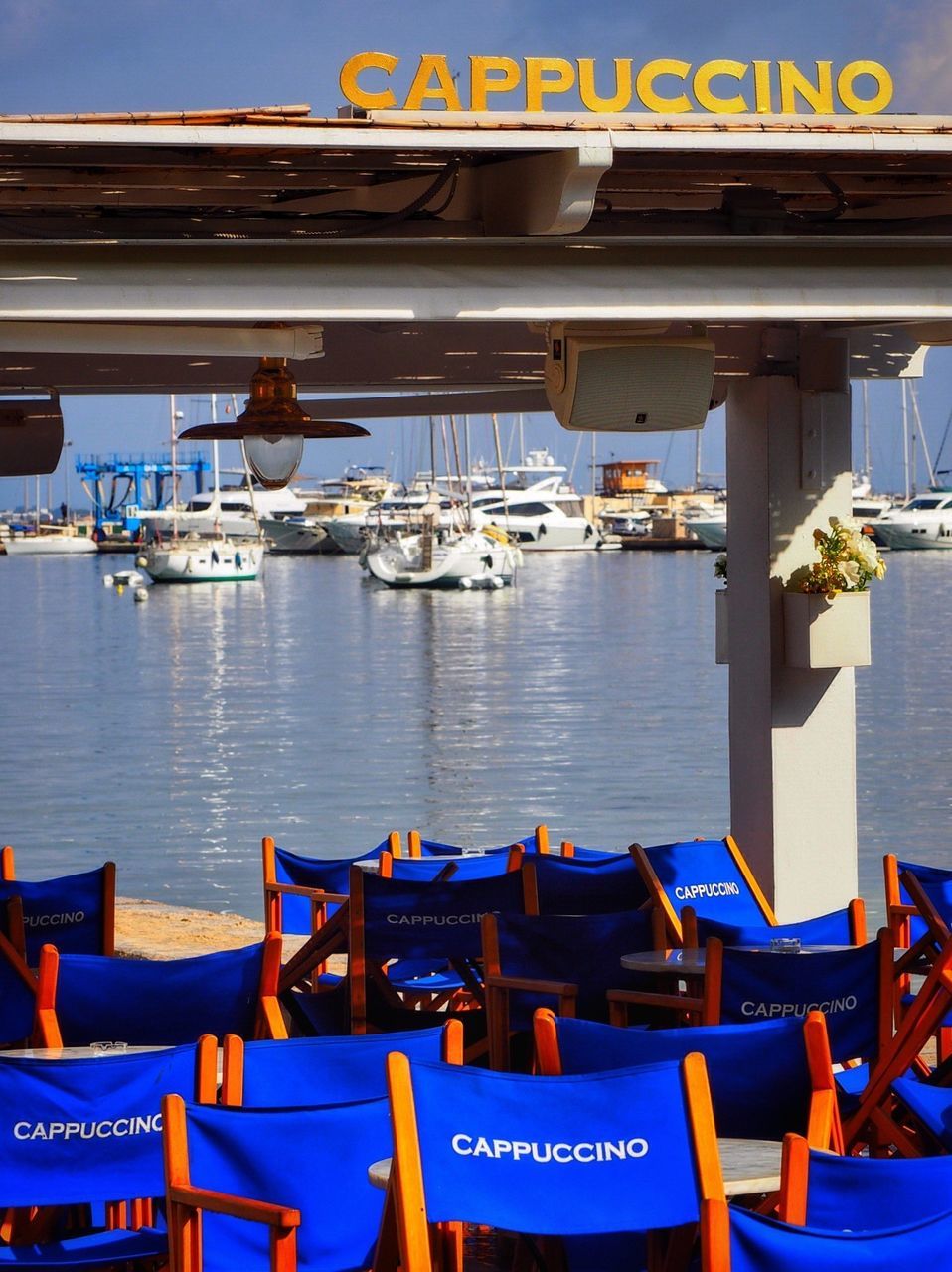 chair, empty, absence, text, day, outdoors, water, table, blue, no people, moored, seat