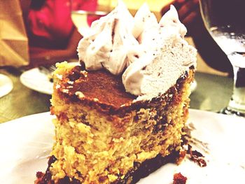 Close-up of cake served on table