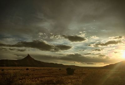 Scenic view of landscape against sky during sunset