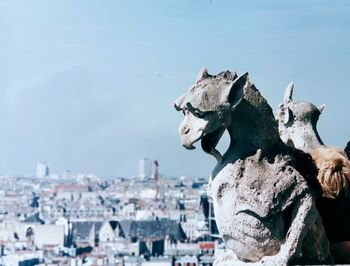 Statue of buildings in city