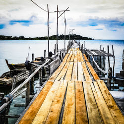 Pier over sea against sky